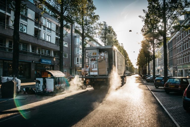 Class B delivery truck making an urban stop on a city street