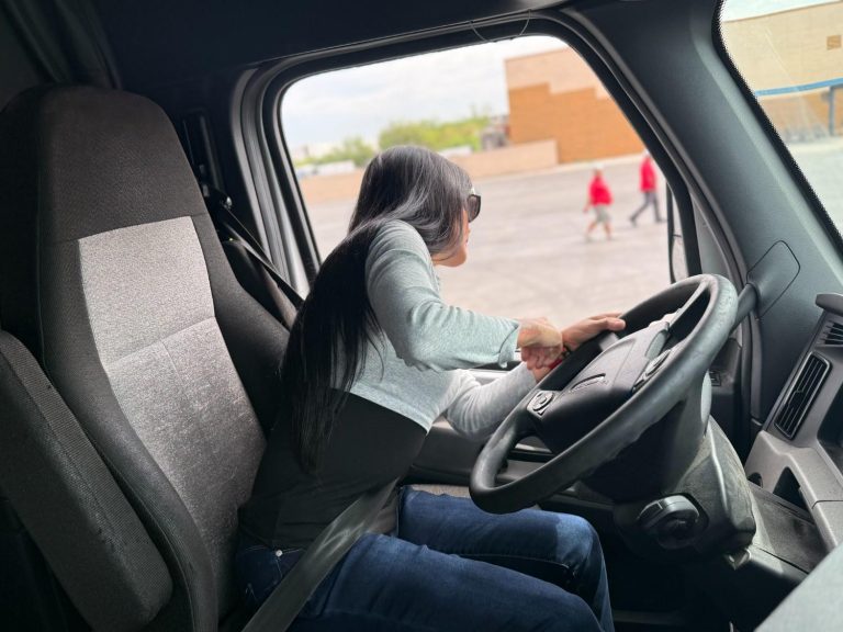 Woman CDL student behind the wheel during behind-the-wheel truck driver training at Southwest Truck Driver Training