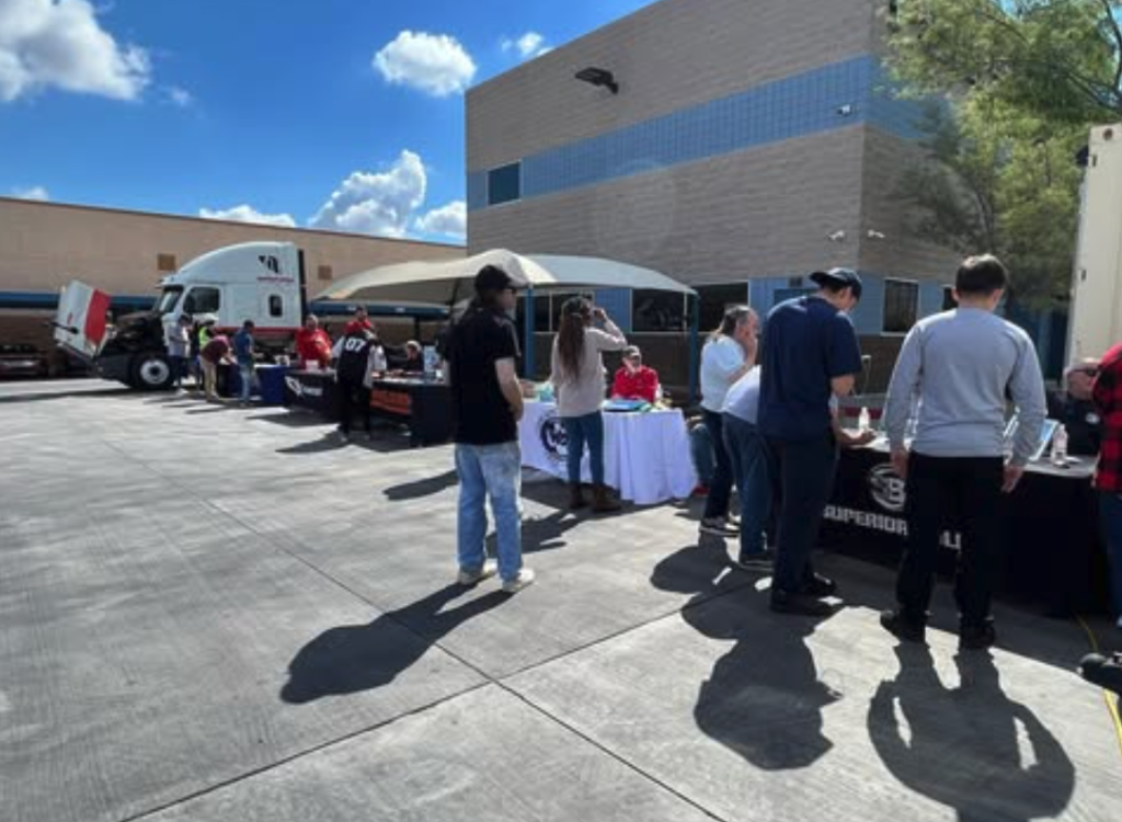 Potential new truck drivers attending a Southwest Truck Driver Training open house