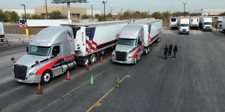 Aerial view of Southwest training yard with semi trucks parked and instructors walking