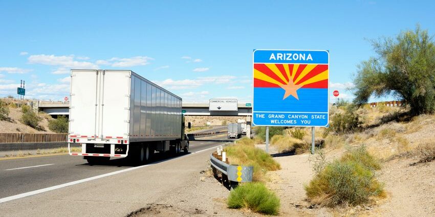 Transport trucks crossing the border into Arizona.